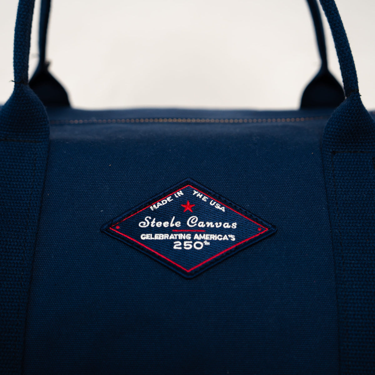 Blue bag with a brand logo on a white background