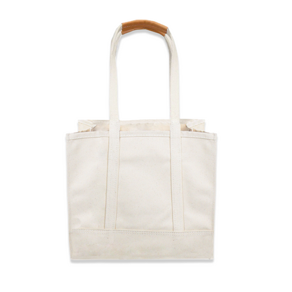 Beige tote bag with brown handle on a white background