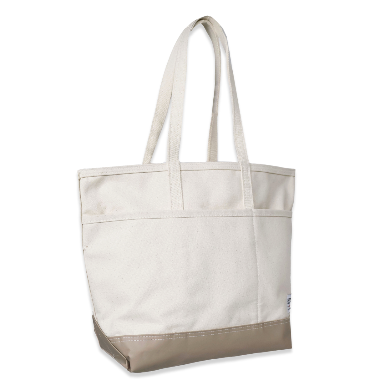 White tote bag with beige bottom section on a white background