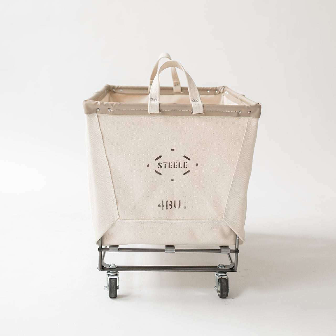 Beige laundry cart with wheels on a white background