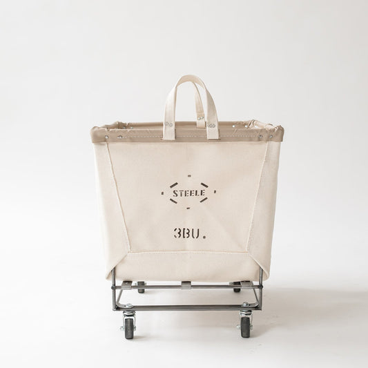 Beige storage cart with 'Steele' branding on a white background