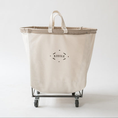Beige laundry basket with wheels on a white background