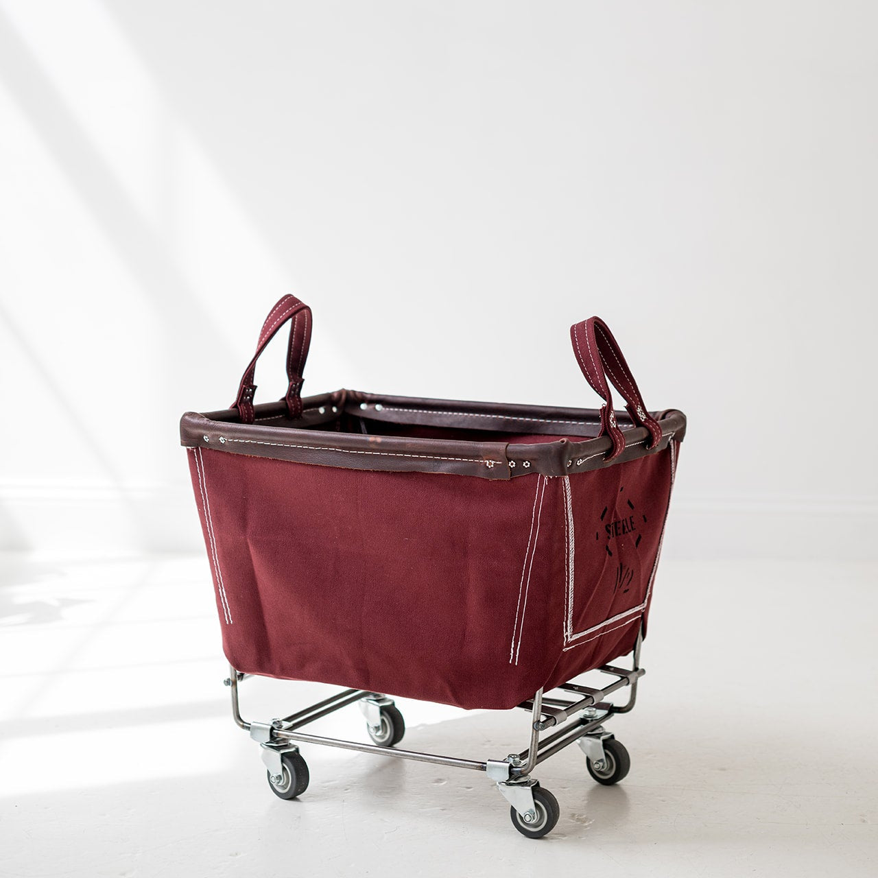 auburn cart with wheels on a white background