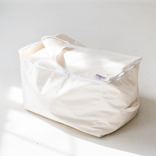 White bean bag chair on a light gray background