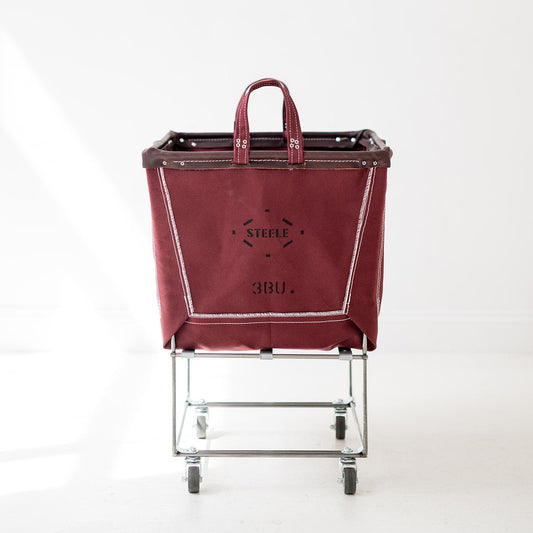 auburn laundry cart with a visible brand logo on a white background