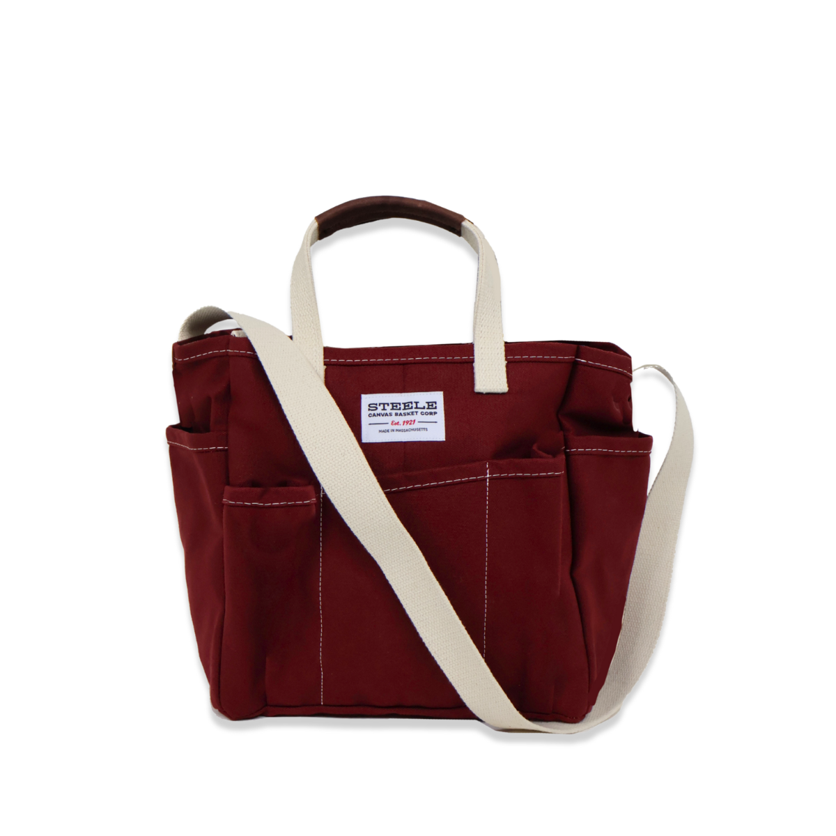 Red tote bag with a white strap on a white background