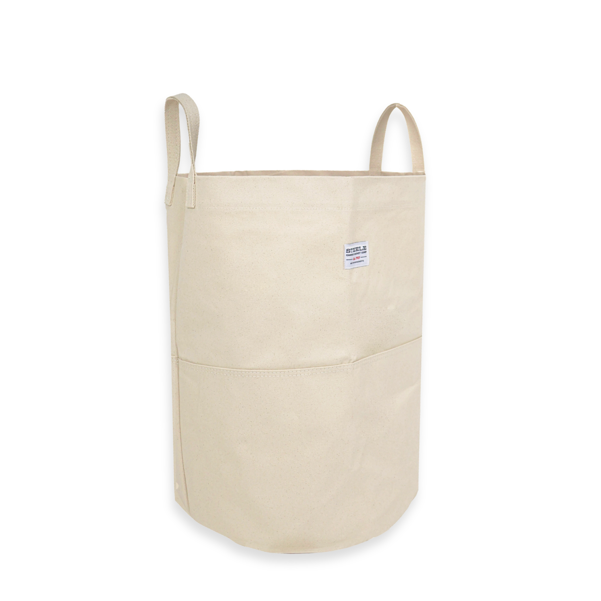 side angle of a tall canvas storage bag with handles on a white background